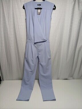 Made Of Emotion (MOE) Asymmetrical Front Panel V Neck Tailored Leg Jumpsuit. S